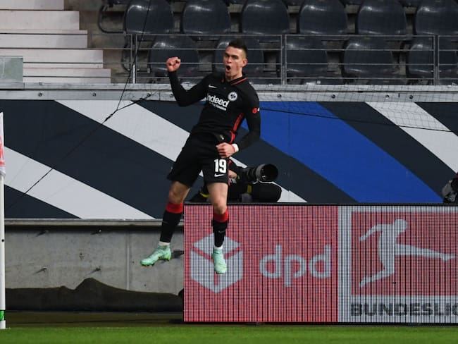 08 January 2022, Hessen, Frankfurt/Main: Soccer: Bundesliga, Eintracht Frankfurt - Borussia Dortmund, Matchday 18 at Deutsche Bank Park. Frankfurt&#039;s Rafael Santos Borré celebrates after his goal for 1:0. Photo: Arne Dedert/dpa - IMPORTANT NOTE: In accordance with the requirements of the DFL Deutsche Fußball Liga and the DFB Deutscher Fußball-Bund, it is prohibited to use or have used photographs taken in the stadium and/or of the match in the form of sequence pictures and/or video-like photo series. (Photo by Arne Dedert/picture alliance via Getty Images)