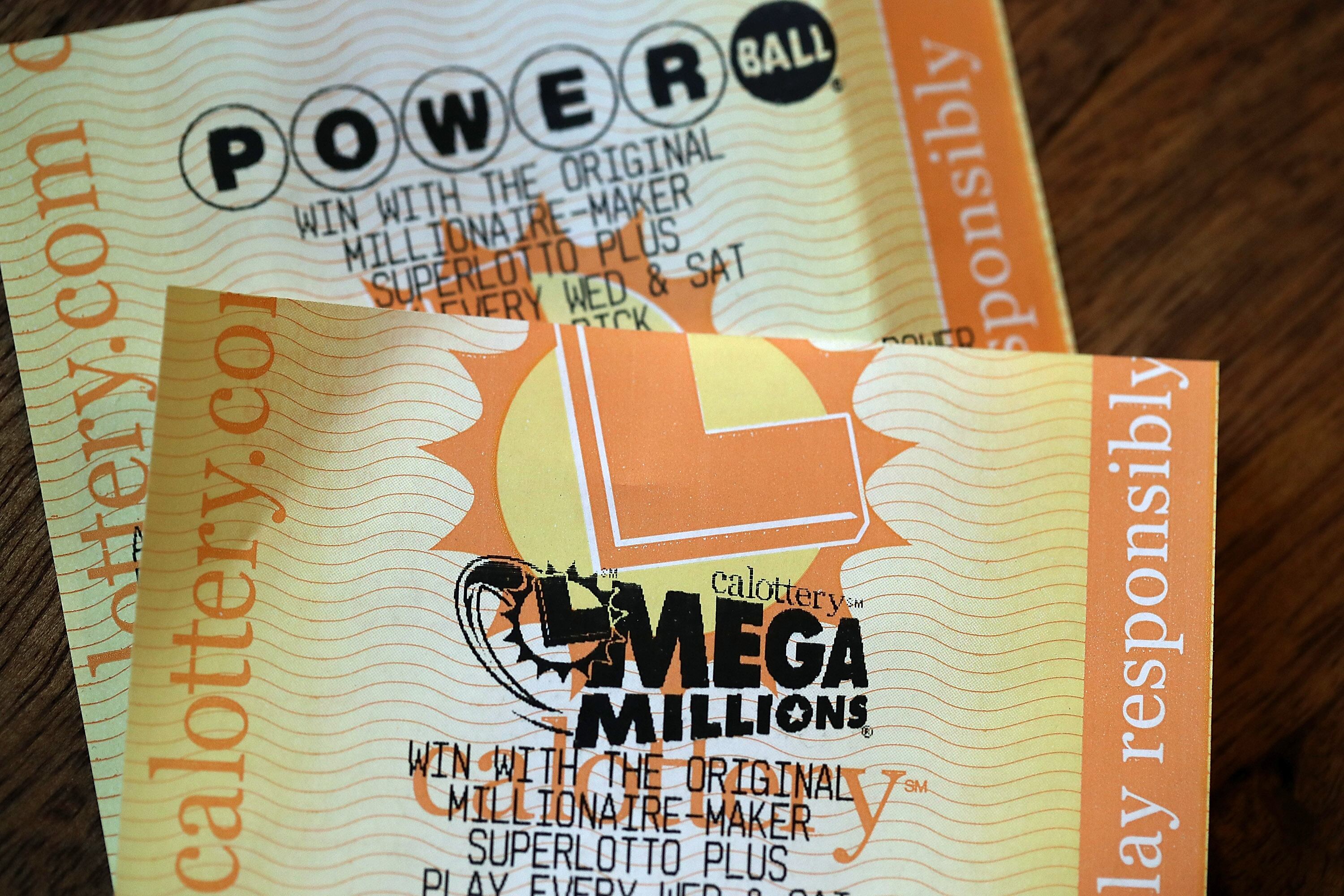 SAN ANSELMO, CA - JANUARY 03:  Powerball and Mega Millions lottery tickets are displayed on January 3, 2018 in San Anselmo, California. The Powerball jackpot and Mega Millions jackpots are both over $400 million at the same time for the first time. The Mega Millions $418 million jackpot would be the fourth largest and the $460 million Powerball jackpot would be the seventh largest in the game's history.  (Photo by Justin Sullivan/Getty Images)