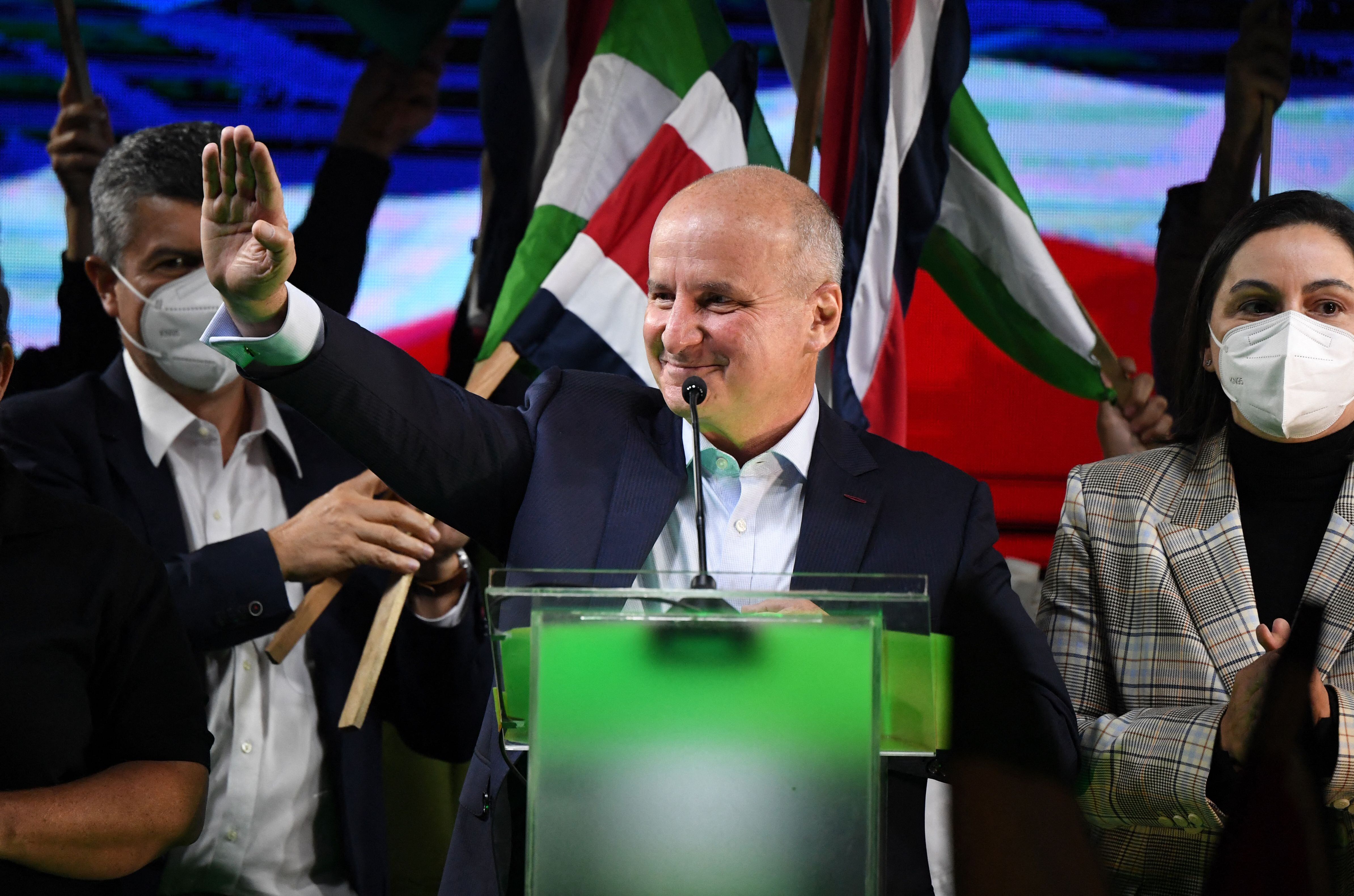 Presidential candidate Jose Maria Figueres of the National Liberation Party (PLN) salutes his supporters as he arrives to speak at his campaign headquarters after the polls closed in San Jose, Costa Rica. (Photo by Luis ACOSTA / AFP) (Photo by LUIS ACOSTA/AFP via Getty Images)