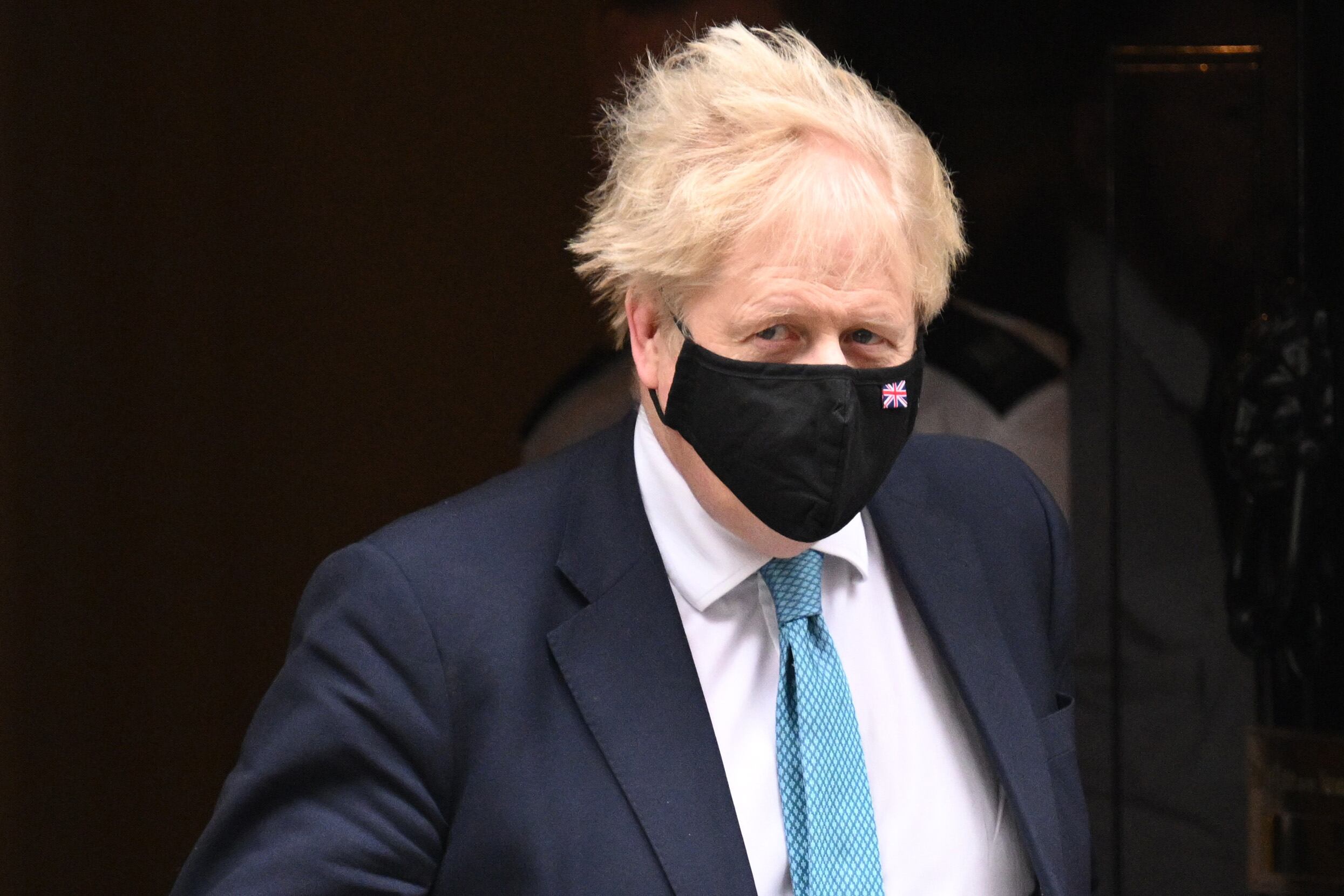 LONDON, UNITED KINGDOM – JANUARY 26:  British Prime Minister Boris Johnson leaves 10 Downing Street to attend the weekly PMQs in the House of Commons on January 26, 2022 in London, England. On Tuesday, the Met Police announced an investigation into the potential criminality of parties held in the Downing Street complex during the pandemic lockdowns. It is expected that the report from Sue Gray, the civil servant leading a government investigation into these parties, will still be released in the coming days. (Photo by Leon Neal/Getty Images)
