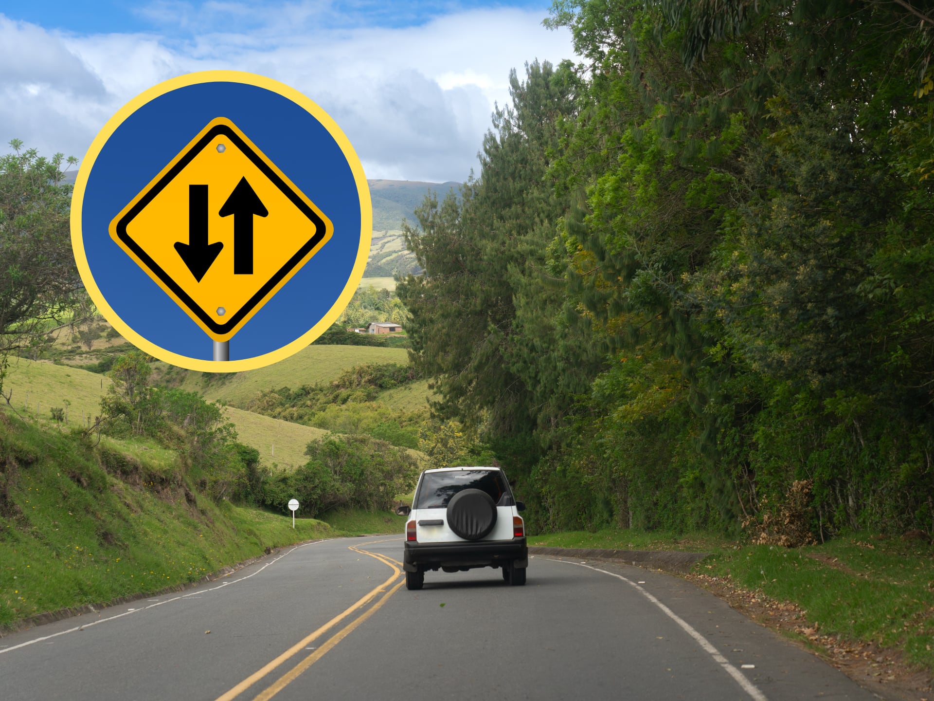 Carretera de Colombia, encima la señal de tránsito de doble vía (GettyImages)