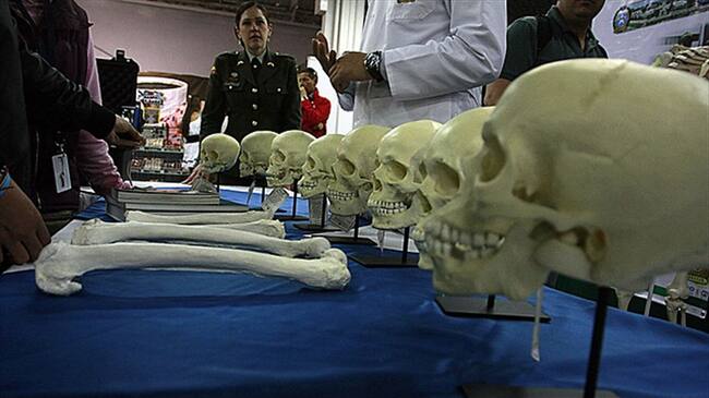 Identificación de cuerpos. Foto: Colprensa