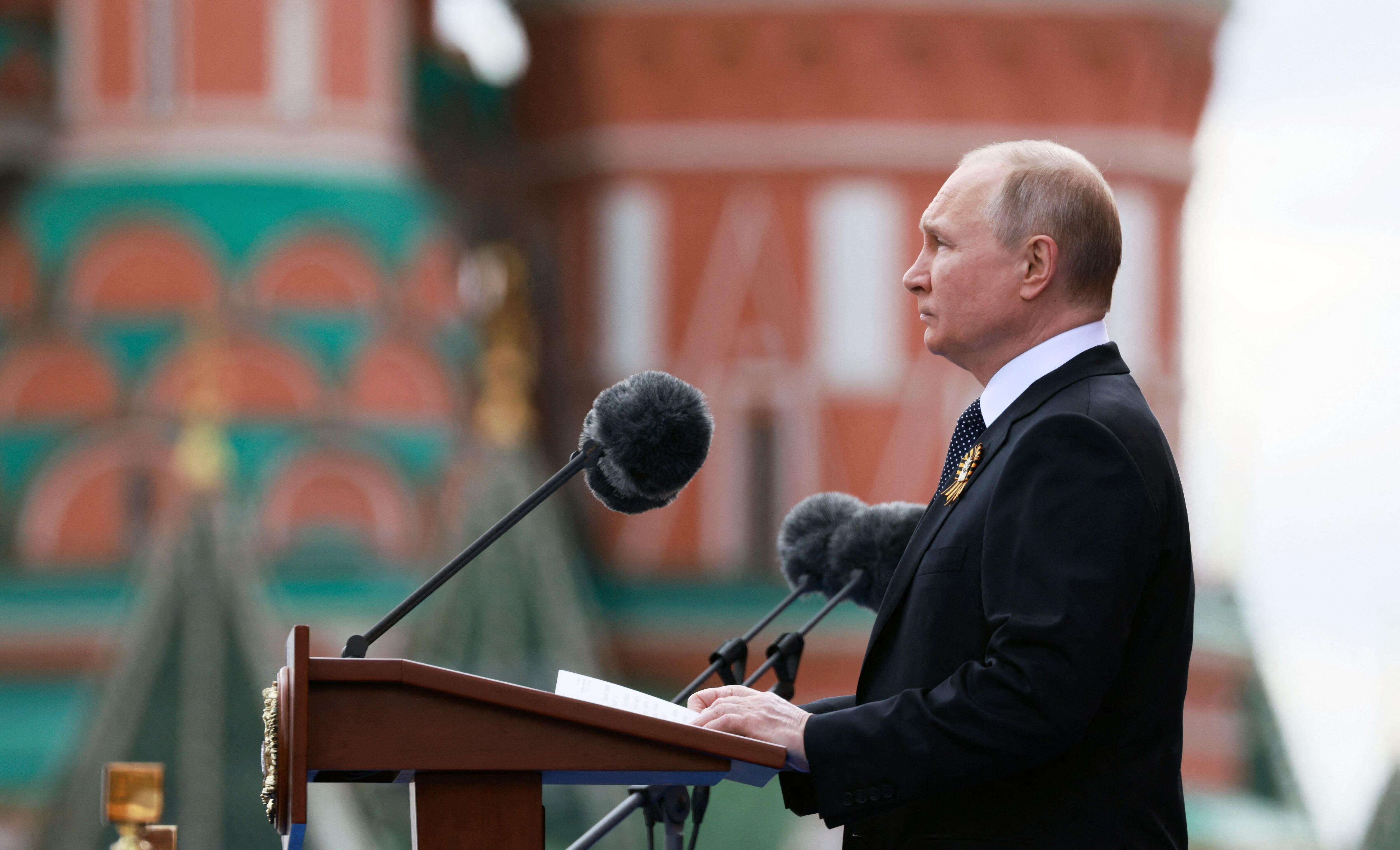 Russian President Vladimir Putin gives a speech during the Victory Day military parade at Red Square in central Moscow on May 9, 2022. - Russia celebrates the 77th anniversary of the victory over Nazi Germany during World War II. (Photo by Mikhail METZEL / SPUTNIK / AFP) (Photo by MIKHAIL METZEL/SPUTNIK/AFP via Getty Images)