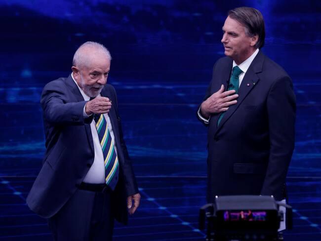 Lula Inácio Da Silva y Jair Bolsonaro debaten frente a frente. Foto: Alexandre Schneider/Getty Images