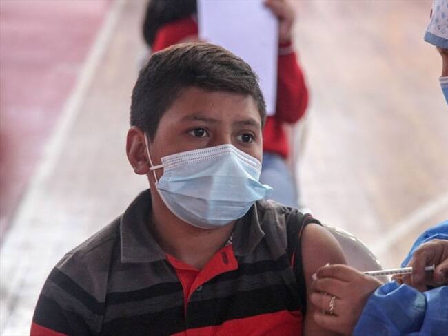 Vacuna de Pfizer/BioNTech es segura para niños entre 5 y 11 años. Foto: (Photo by Xavier Caivinagua/Agencia Press South/Getty Images)