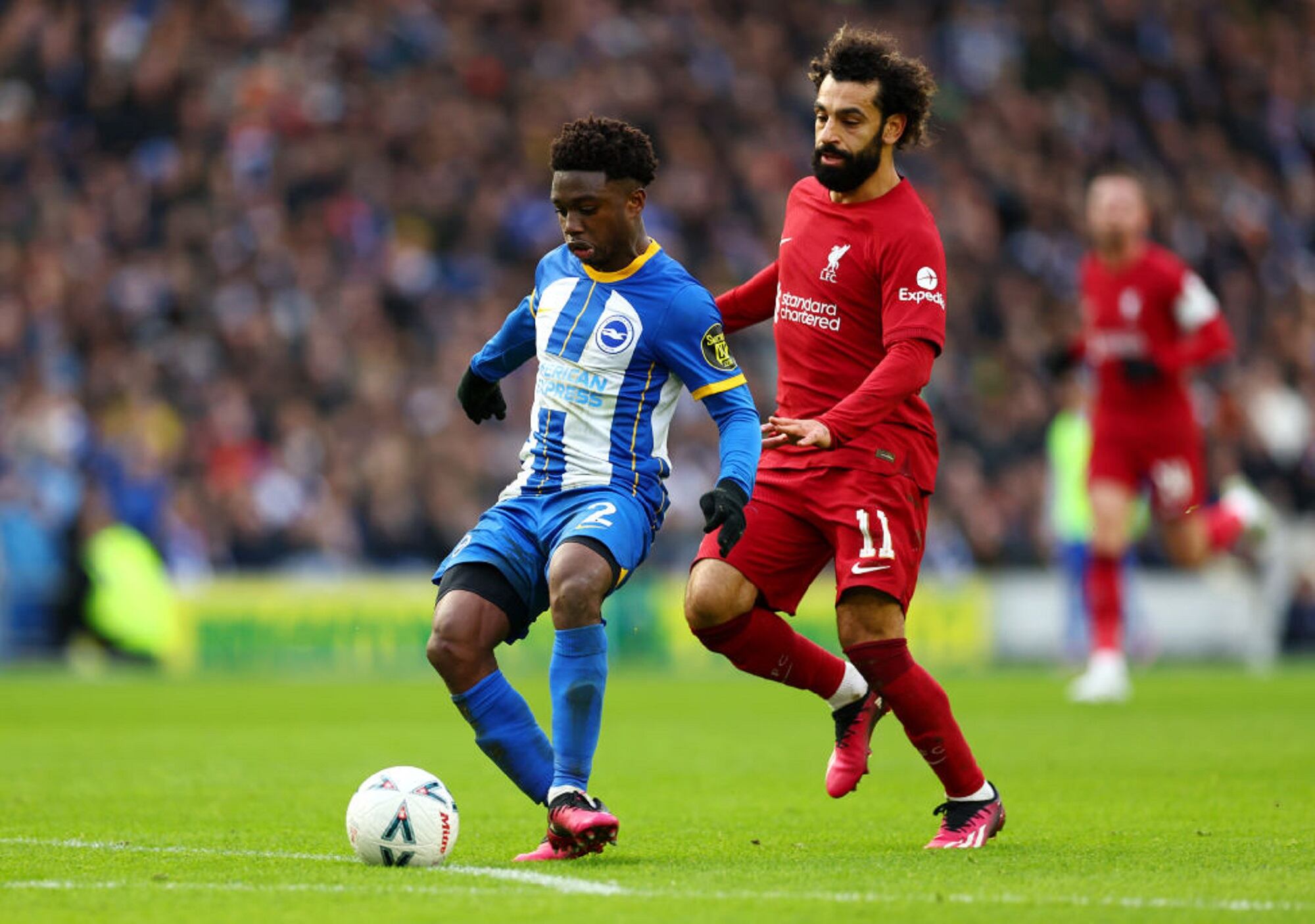 Tariq Lamptey y Mohamed Salah. (Photo by Bryn Lennon/Getty Images)