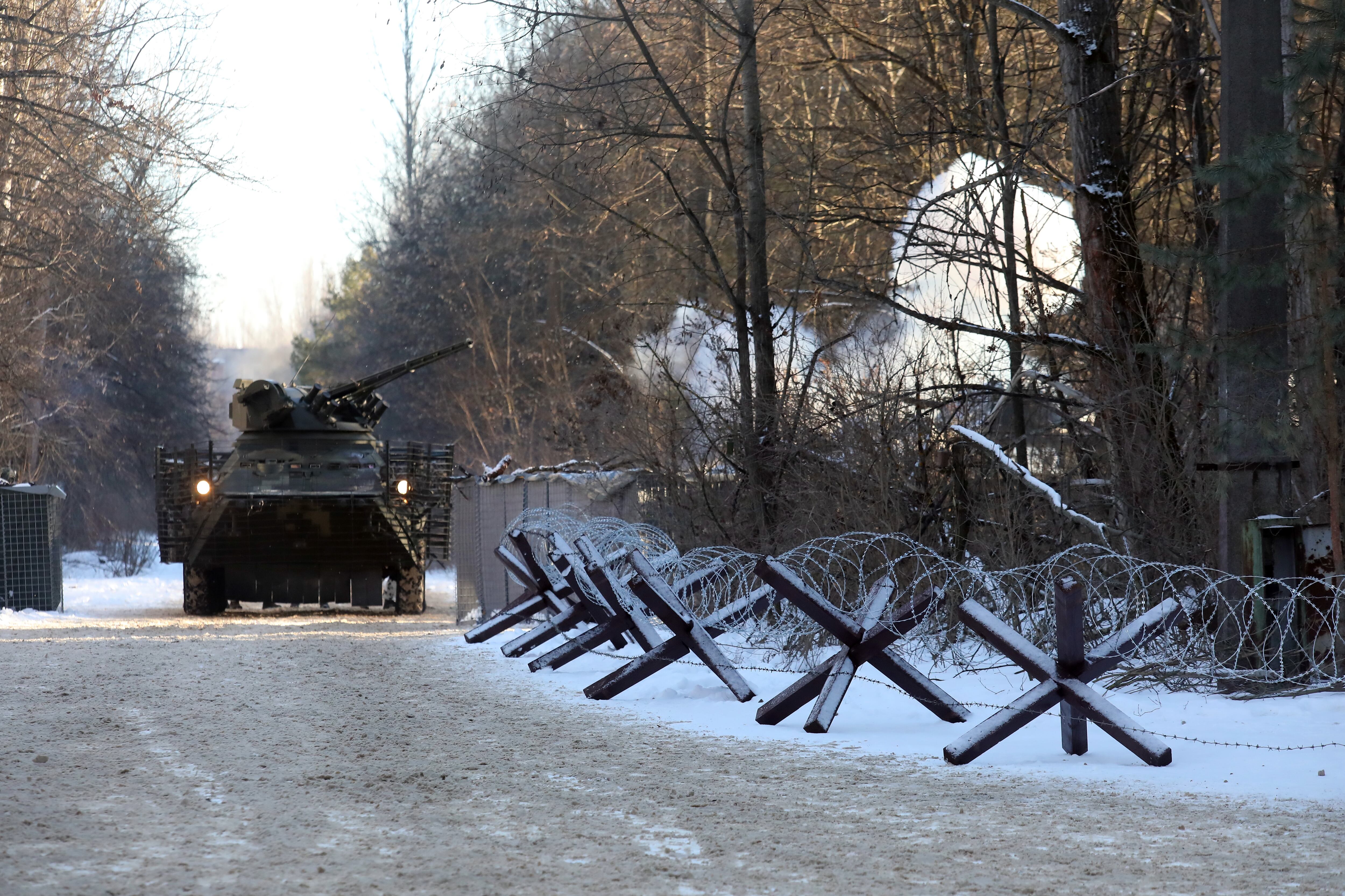 PRYPIAT, UKRAINE - FEBRUARY 4, 2022 - A military vehicle with spaced armour is pictured during tactical drills for Ukrainian Interior Ministry units to practice interoperability while defending a city, urban combat tactics and response to the aftermath of the hostilities in a city, Prypiat, the Chornobyl Exclusion Zone, Kyiv Region, northern Ukraine. (Photo credit should read Volodymyr Tarasov/ Ukrinform/Future Publishing via Getty Images)