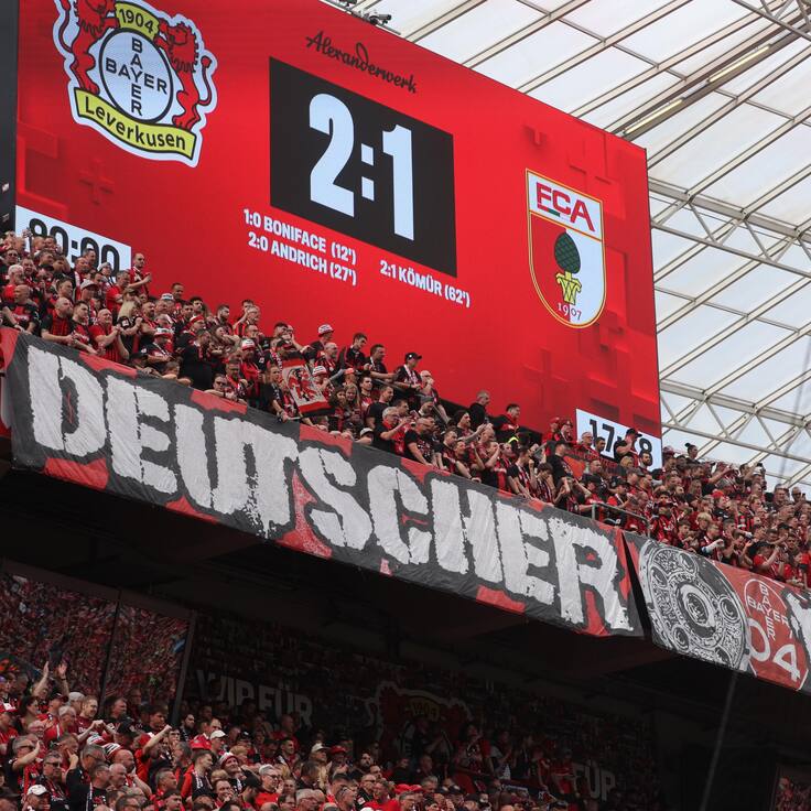Leverkusen (Germany), 18/05/2024.- Supporters of Leverkusen show a banner reading &#039;German Champion&#039; after the German Bundesliga soccer match of Bayer 04 Leverkusen against FC Augsburg, in Leverkusen, Germany, 18 May 2024. (Alemania) EFE/EPA/CHRISTOPHER NEUNDORF CONDITIONS - ATTENTION: The DFL regulations prohibit any use of photographs as image sequences and/or quasi-video.