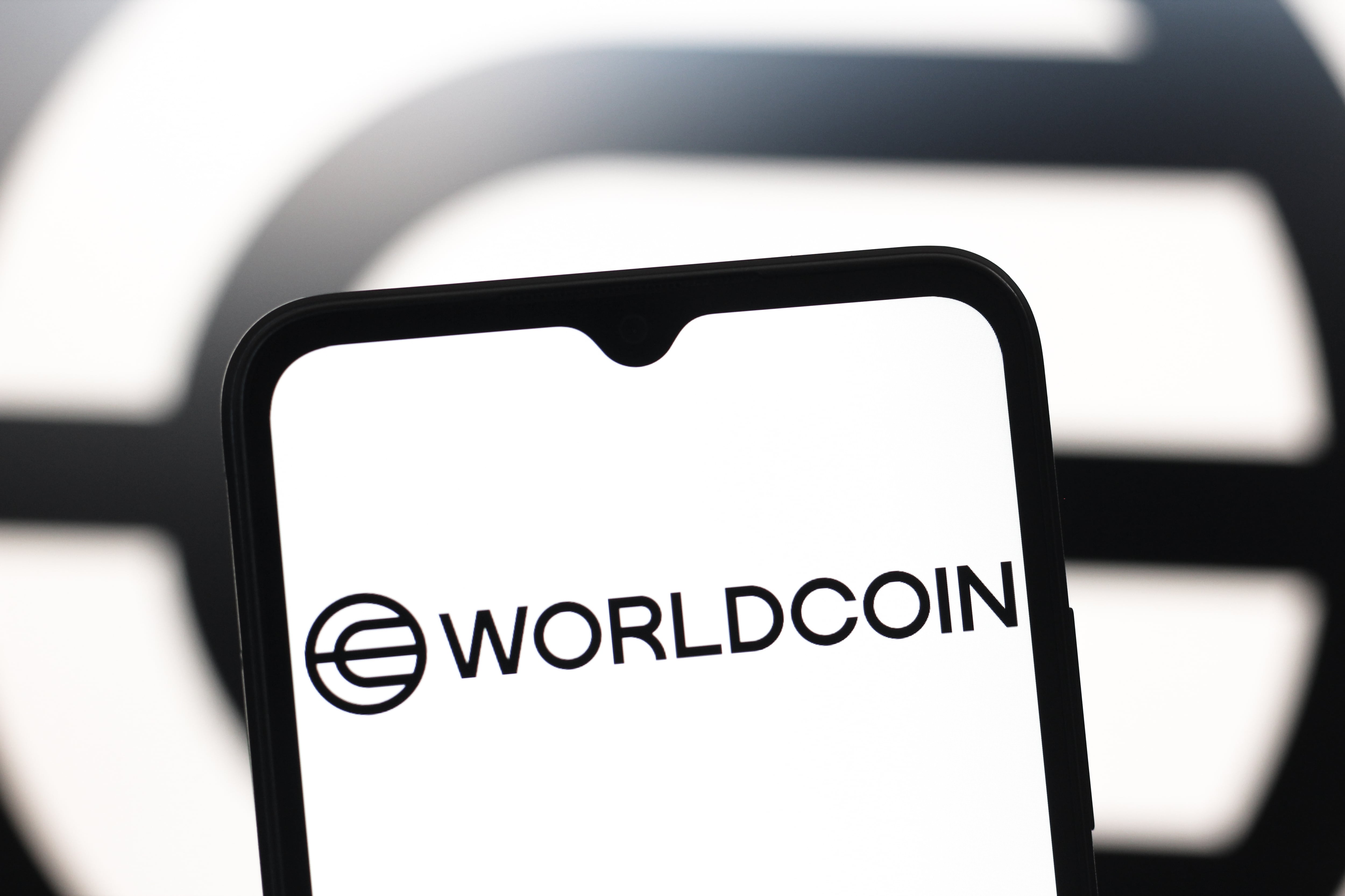 Worldcoin logo. (Photo Illustration by Thomas Fuller/SOPA Images/LightRocket via Getty Images)