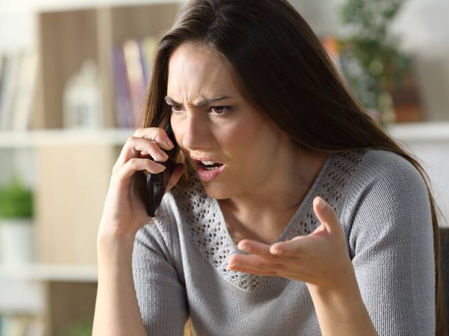 Hablando por teléfono, imagen de referencia | Foto: GettyImages