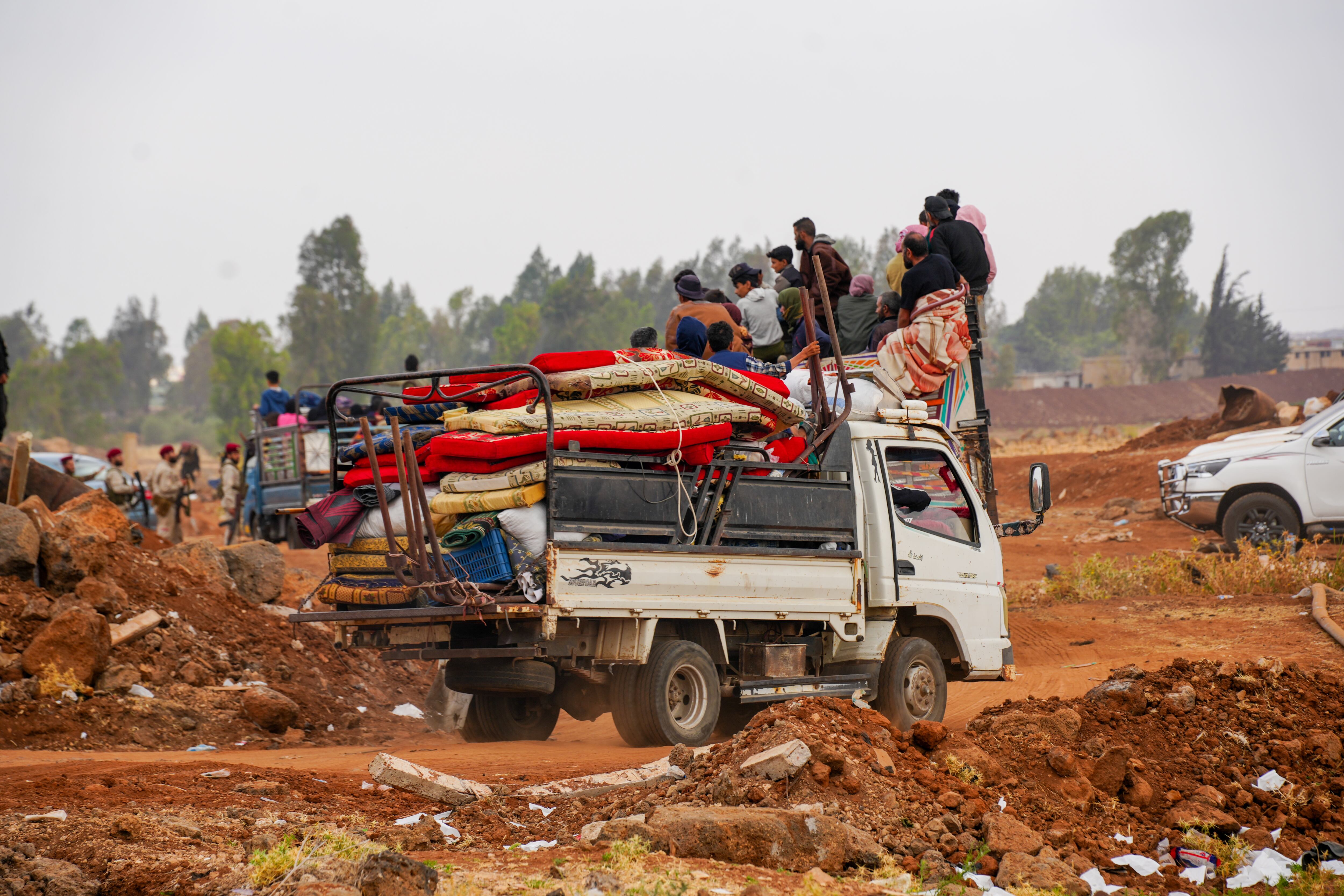 Evacuación de personas en la ciudad siria de Al Sueida. (Photo by Rami Alsayed/NurPhoto via Getty Images)