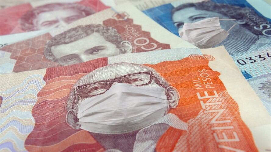 En su informe semanal, Corficolombiana advierte que el grado de inversión de Colombia seguirá en riesgo y podría perderse en 2021. Foto: Getty Images / LAURA OLEJUA