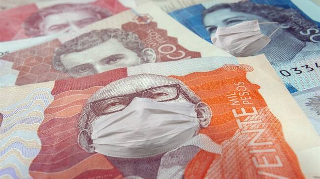 En su informe semanal, Corficolombiana advierte que el grado de inversión de Colombia seguirá en riesgo y podría perderse en 2021. Foto: Getty Images / LAURA OLEJUA