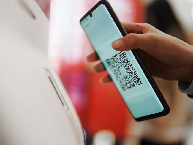 Imagen de referencia de pago con Código QR. Foto: Getty Images.