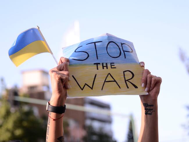 MEXICO CITY, MEXICO - FEB 28, 2022: People with flags and signs demonstrate against the Russian military invasion of Ukraine outside the Russian Federation embassy in Mexico City, on February 28, 2022. (Photo credit should read Carlos Tischler / Eyepix Group/Future Publishing via Getty Images)