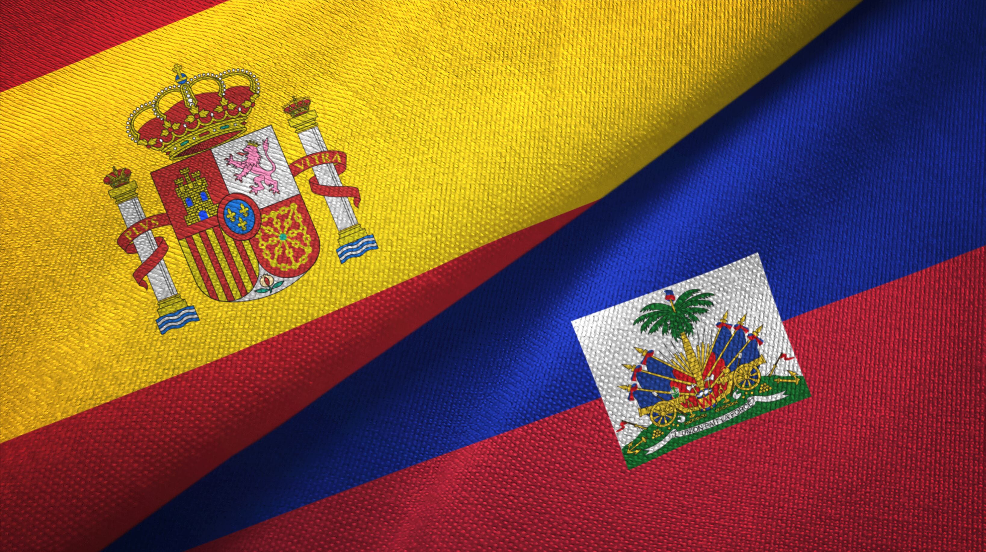 Banderas de España y Haiti. Getty Images