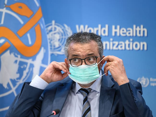 World Health Organization (WHO) Director-General Tedros Adhanom Ghebreyesus, wearing a protective facemask, attends a press conference on December 20, 2021 at the WHO headquarters in Geneva. - The World Health Organization chief called for the world to pull together and make the difficult decisions needed to end the Covid-19 pandemic within the next year. (Photo by Fabrice COFFRINI / AFP) (Photo by FABRICE COFFRINI/AFP via Getty Images)