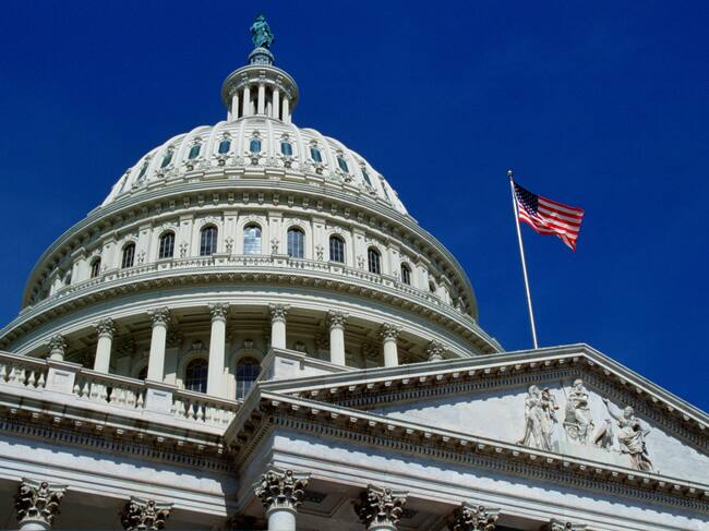 WASHINGTON, UNITED STATES - JANUARY 01: The stars and stripes flag flying at the Capitol Building, Washington, USA.