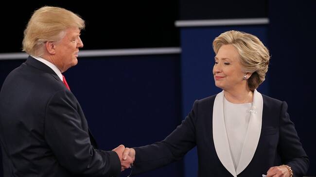 Hillary Clinton y donald Trump durante el debate presidencial de EE.UU. Foto: Agencia EFE - Gary He