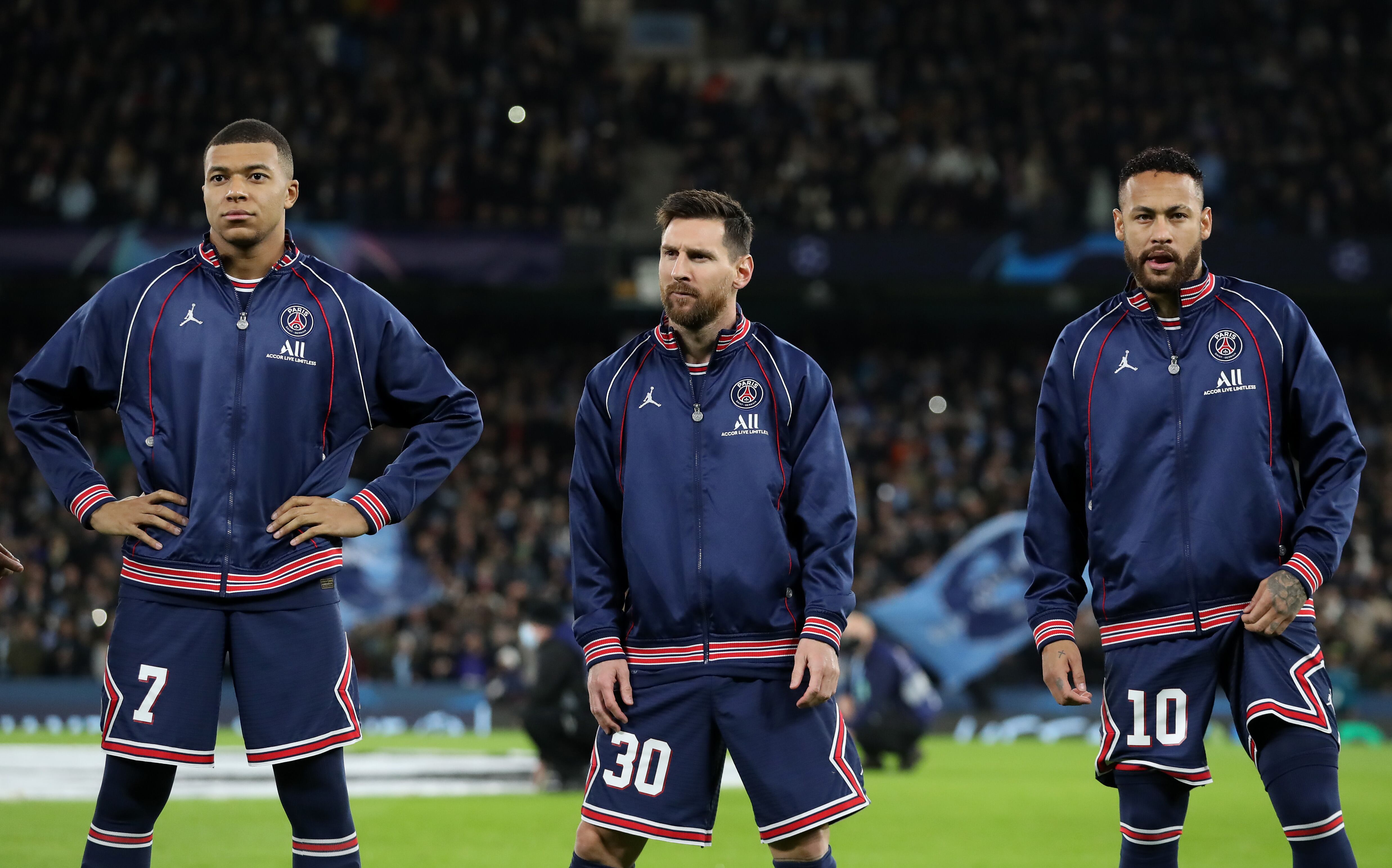 MANCHESTER, ENGLAND - NOVEMBER 24: Kylian Mbappe, Lionel Messi and Neymar of Paris Saint-Germain line up prior to the UEFA Champions League group A match between Manchester City and Paris Saint-Germain at Etihad Stadium on November 24, 2021 in Manchester, England. (Photo by Jan Kruger - UEFA/UEFA via Getty Images)