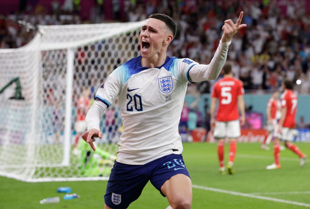 DOHA, QATAR - NOVEMBER 29: Phil Foden of England celebrtates goal during the FIFA World Cup Qatar 2022 Group B match between Wales and England at Al Janoub Stadium on November 29, 2022 in Doha, Qatar. (Photo by Richard Sellers/Getty Images)