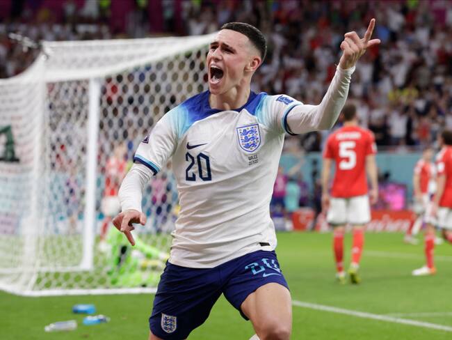 DOHA, QATAR - NOVEMBER 29: Phil Foden of England celebrtates goal during the FIFA World Cup Qatar 2022 Group B match between Wales and England at Al Janoub Stadium on November 29, 2022 in Doha, Qatar. (Photo by Richard Sellers/Getty Images)