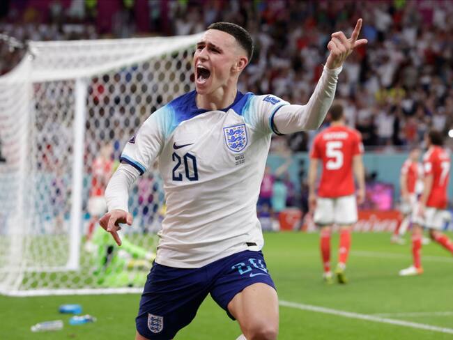 DOHA, QATAR - NOVEMBER 29: Phil Foden of England celebrtates goal during the FIFA World Cup Qatar 2022 Group B match between Wales and England at Al Janoub Stadium on November 29, 2022 in Doha, Qatar. (Photo by Richard Sellers/Getty Images)