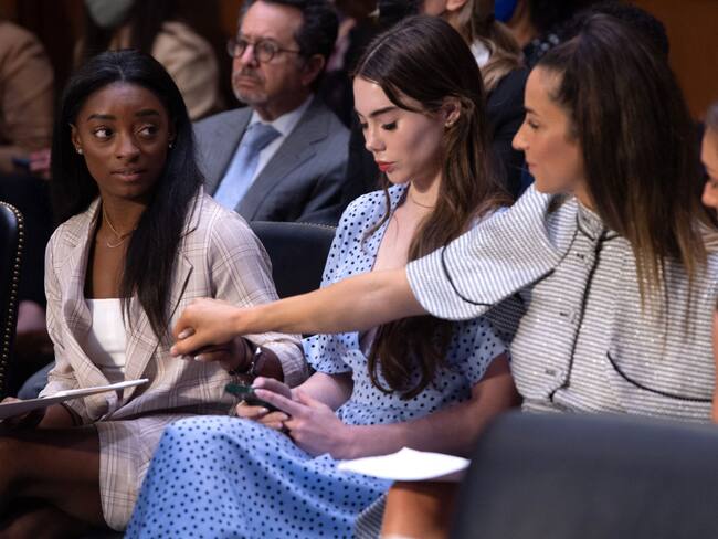 TOPSHOT - US Olympic gymnasts (L-R) Simone Biles, McKayla Maroney, Aly Raisman and Maggie Nichols, arrive to testify during a Senate Judiciary hearing about the Inspector General's report on the FBI handling of the Larry Nassar investigation of sexual abuse of Olympic gymnasts, on Capitol Hill, September 15, 2021, in Washington, DC. (Photo by SAUL LOEB / POOL / AFP) (Photo by SAUL LOEB/POOL/AFP via Getty Images)