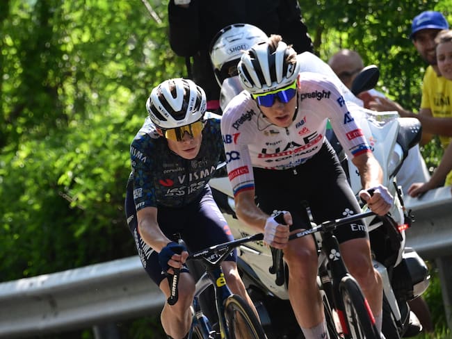 Bologna (Italy), 30/06/2024.- Slovenian rider Tadej Pogacar (R) of UAE Team Emirates and Danish rider Jonas Vingegaard of Team Visma Lease a Bike in action during the second stage of the 2024 Tour de France cycling race over 199km from Cesenatico to Bologna, Italy, 30 June 2024. (Ciclismo, Francia, Italia, Eslovenia) EFE/EPA/BERNARD PAPON / POOL