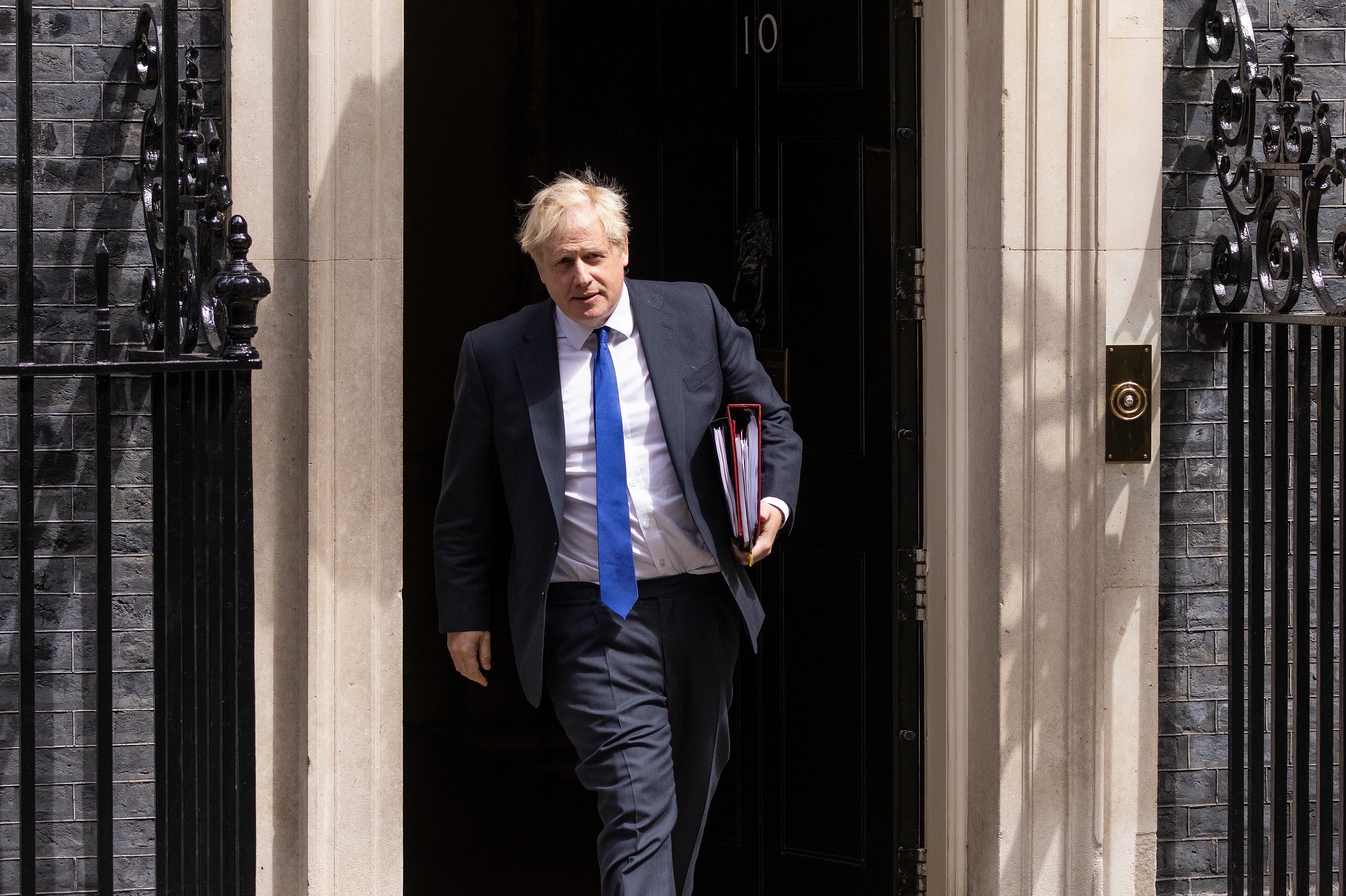 LONDON, ENGLAND - JULY 06: Prime Minister Boris Johnson leaves 10 Downing Street for PMQ's on July 6, 2022 in London, England. Minister for Health, Sajid Javid, resigned from the Government on Tuesday evening, closely followed by the Chancellor of The Exchequer, Rishi Sunak. Boris Johnson moved swiftly to shore up his Prime Ministership making his Chief of Staff, Steve Barclay, Minister for Health and promoting Education Secretary Nadim Zahawi, to Chancellor of the Exchequer. (Photo by Dan Kitwood/Getty Images)