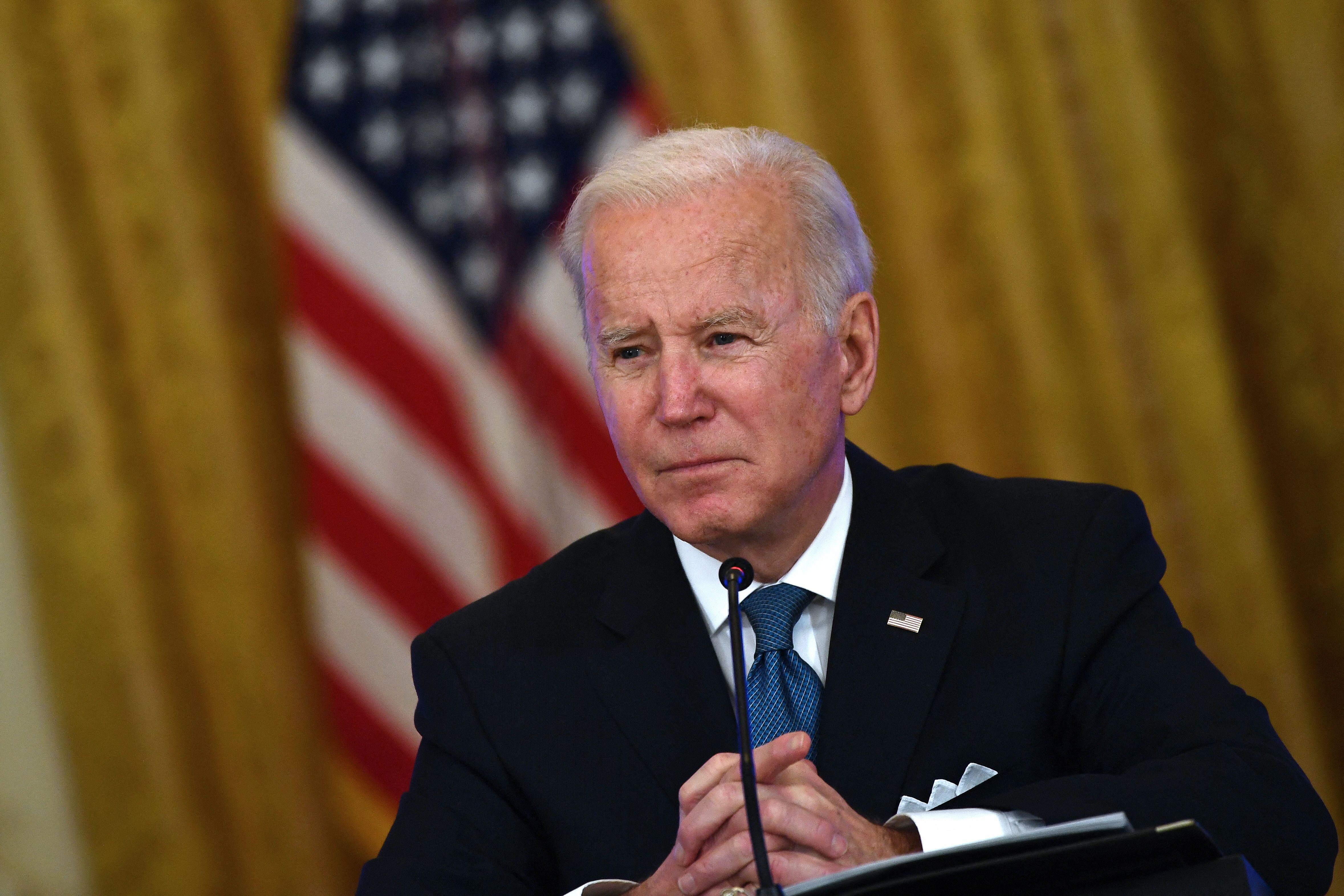 US President Joe Biden speaks as he meets with members of his administration on efforts to lower prices for working families at the East room of the White House, in Washington, DC on January 24, 2022. (Photo by Brendan Smialowski / AFP) (Photo by BRENDAN SMIALOWSKI/AFP via Getty Images)