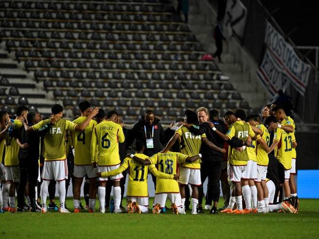 Colombian players pray at the end Argentina 2023 U-20 World Cup Group C football match between Japon and Colombia at the Diego Armando Maradona stadium in La Plata, Argentina, on May 24, 2023. (Photo by LUIS ROBAYO / AFP) (Photo by LUIS ROBAYO/AFP via Getty Images)