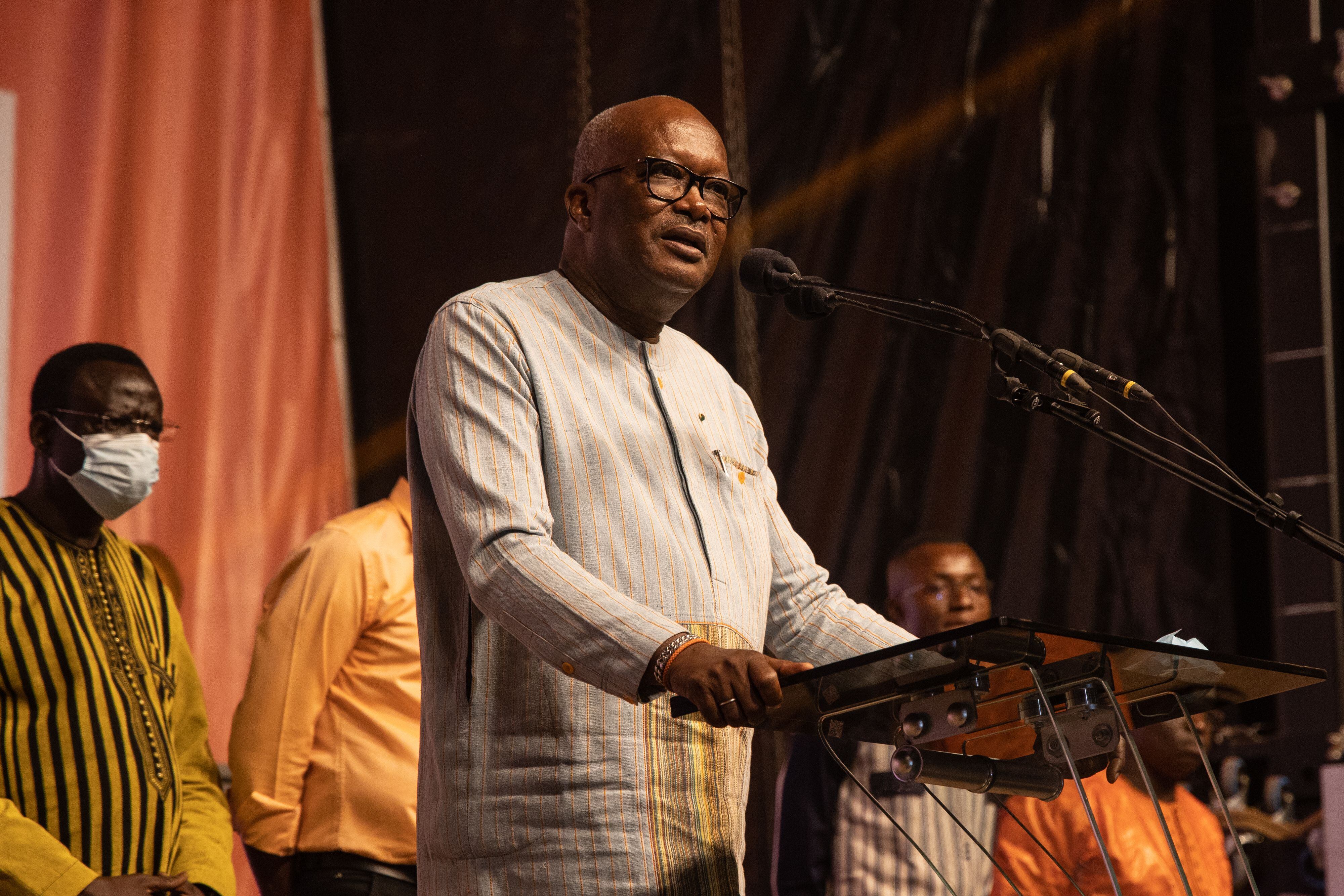 Burkina Faso President Roch Marc Christian Kaboré addresses supporters during a celebration at the partys headquarter in Ouagadougou, on November 26, 2020. - Burkina Faso's President Roch Marc Christian Kabore was re-elected by a landslide, according to election results announced Thursday, which the opposition "reserved the right" to challenge. (Photo by OLYMPIA DE MAISMONT / AFP) (Photo by OLYMPIA DE MAISMONT/AFP via Getty Images)