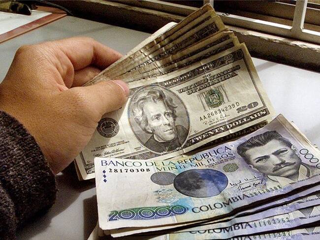 "Las condiciones globales se han deteriorado rápidamente y la tasa de cambio está respondiendo de forma previsible a estos cambios", dicen las entidades. Foto: Getty Images