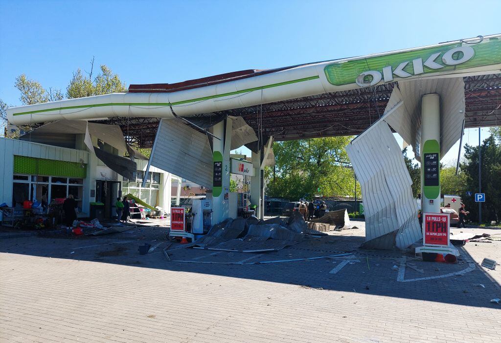 This photograph taken on May 3, 2023, shows a damaged gas station near a train station building following a Russian strike in the southern Ukrainian town of Kherson amid the Russian invasion of Ukraine. - Russian strikes on Ukraine's southern Kherson region killed 16 people on May 3, 2023, local prosecutors said as authorities introduced a curfew in the main city of Kherson starting on May 5, 2023. (Photo by Dina Pletenchuk / AFP) (Photo by DINA PLETENCHUK/AFP via Getty Images)