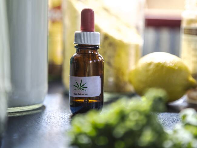 Eye dropper bottle of CBD oil used widely for medicine and wellbeing.