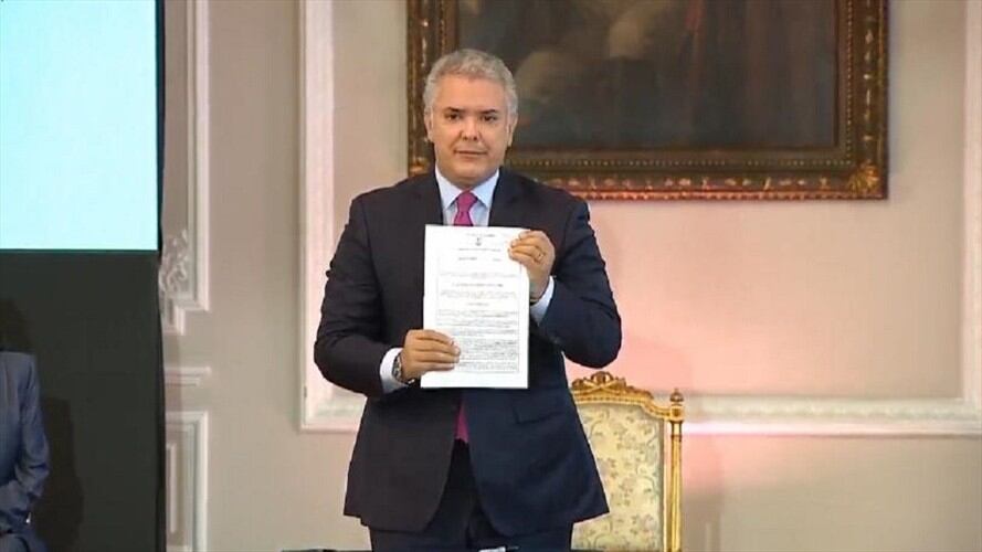 El presidente Iván Duque firmó el decreto que crea el Estatuto Temporal para la Protección de Migrantes Venezolanos. Foto: Presidencia de la República