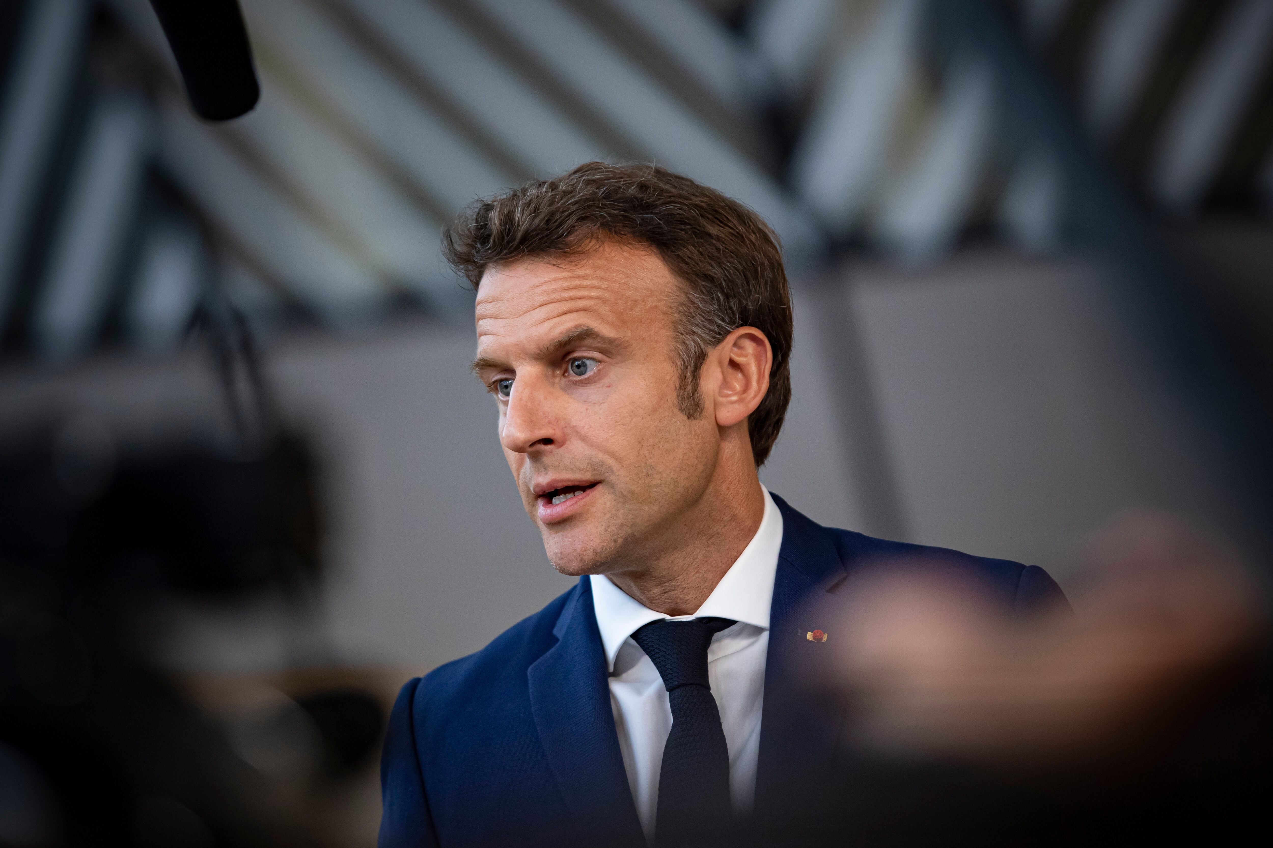 Emmanuel Macron President of the Republic of France talks to the media after the end of the 2-day extraordinary special EU summit about Ukraine, Energy and Defense, agreeing on a sixth wave of sanctions against Russia and Russian oil exports with special pipeline exemptions to Hungary. Meeting of the 27 EU leaders at the European Council in Brussels, Belgium on May 31, 2022 (Photo by Nicolas Economou/NurPhoto via Getty Images)