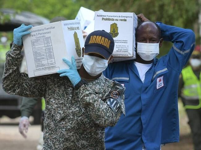 Se busca habilitar 65 carrotanques de agua potable en regiones como Soacha, seis hospitales móviles de campaña y ocho albergues para migrantes y habitantes de calle durante el aislamiento. Foto: Presidencia de la República