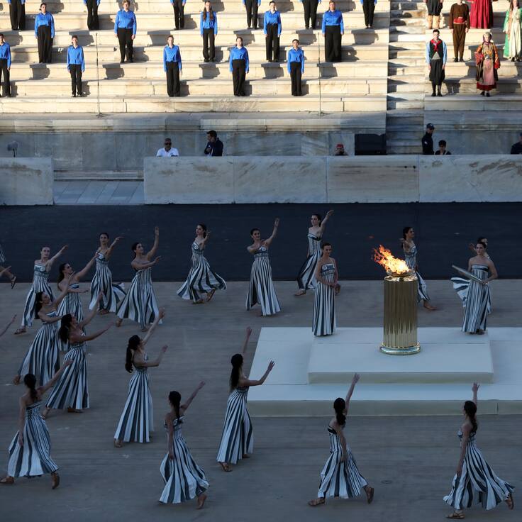 Athens (Greece), 26/04/2024.- Greek actresses playing the role of priestesses perform during the Olympic Flame handover ceremony, at the Panathenaic Stadium, Athens, Greece, April 26, 2024. The Summer Olympic Games will be held in Paris, France from 26 July to 11 August 2024. (Francia, Grecia, Atenas) EFE/EPA/GEORGE VITSARAS