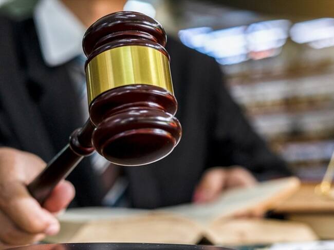 El sentenciado fue declarado responsable de los delitos de homicidio agravado y hurto calificado, y deberá permanecer en la cárcel La Modelo de Bogotá. Foto: Getty Images / NARUECHA JENTHAISON