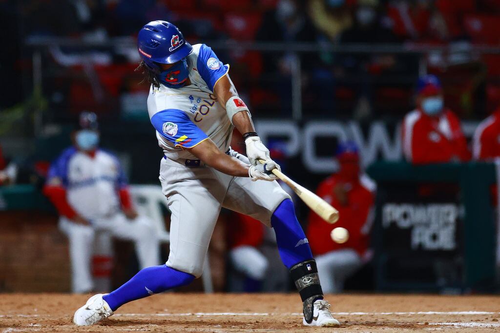 MAZATLAN, MEXICO - FEBRUARY 04: Adam Walker II #26 of Caimanes de Barranquilla of Colombia hits a foul ball on the 7th inning during the game between Colombia and Dominican Republic as part of Serie del Caribe 2021 at Teodoro Mariscal Stadium on February 04, 2021 in Mazatlan, Mexico. (Photo by Hector Vivas/Getty Images)