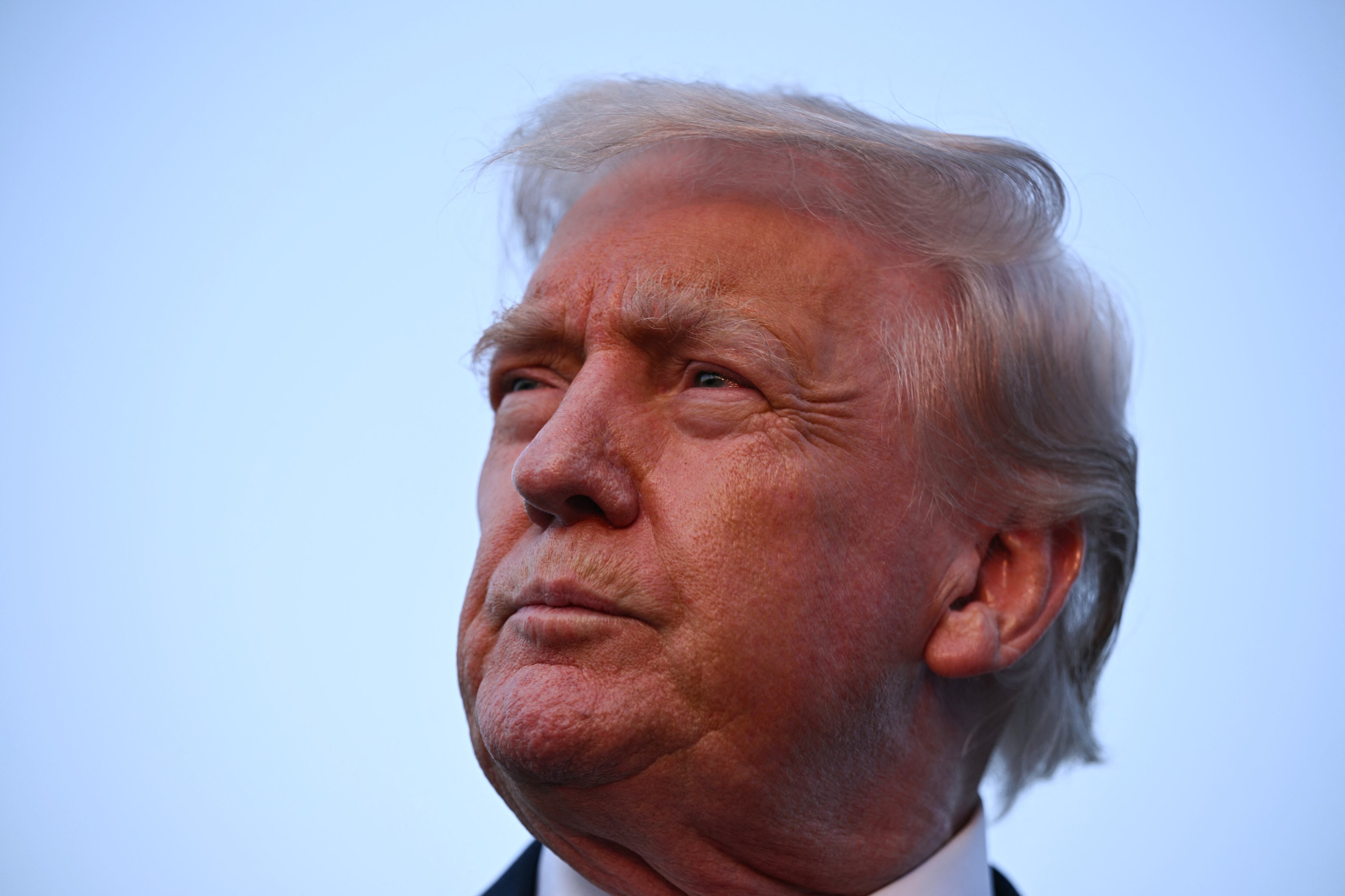 US President Donald Trump speaks to journalists at Lehigh Valley International Airport in Allentown, Pennsylvania, on August 3, 2025 as returns to the White House from his Bedminster residence, where he spent the weekend. (Photo by Brendan SMIALOWSKI / AFP) (Photo by BRENDAN SMIALOWSKI/AFP via Getty Images)          