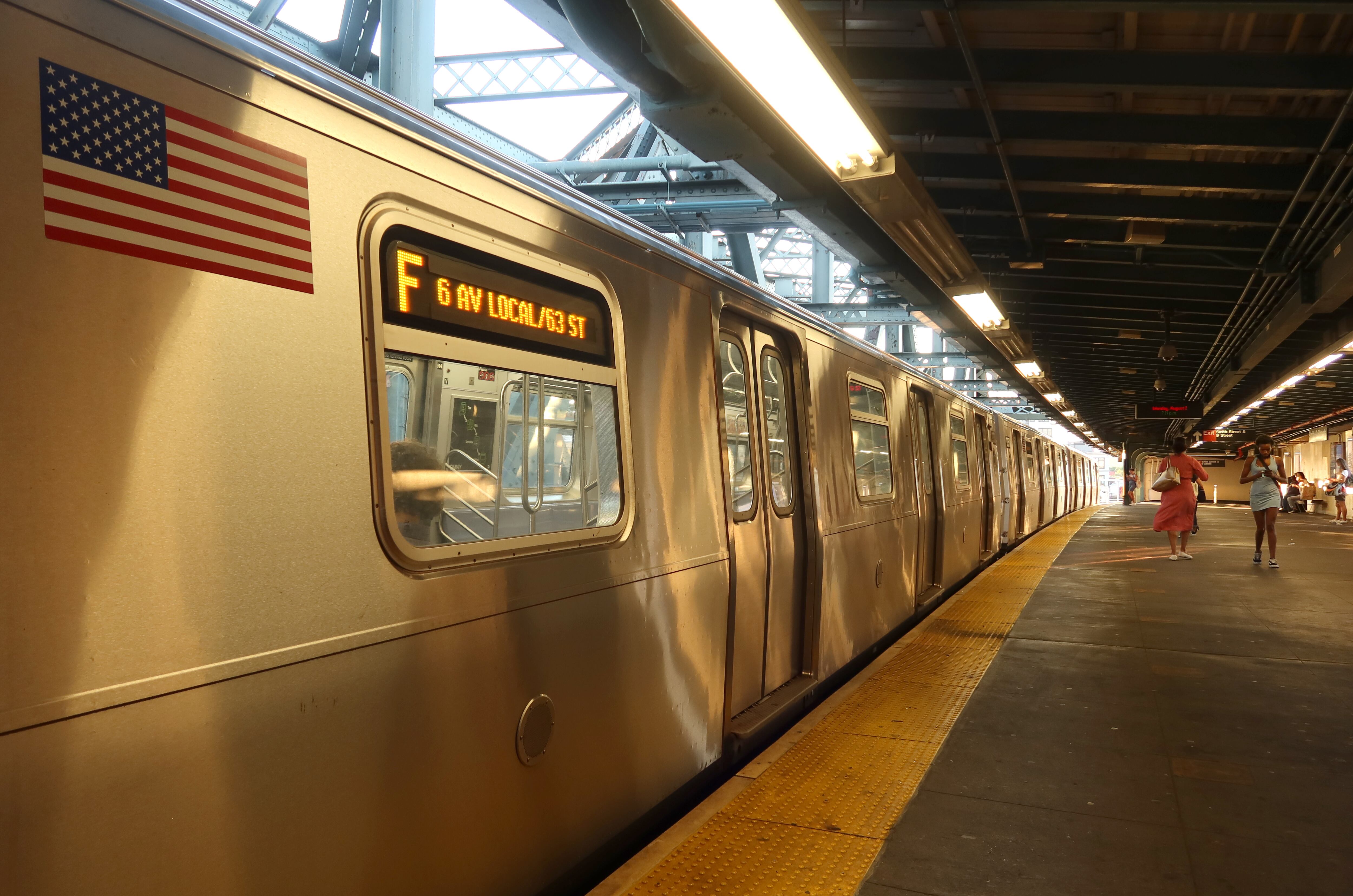 NEW YORK, NY - AUGUST 2: An F train waits to pull out of the Smith - 9th Street station in Brooklyn on August 2, 2021 in New York City. (Photo by Gary Hershorn/Getty Images)