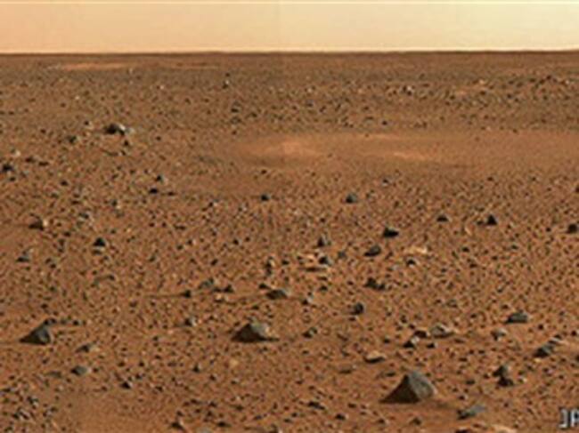 El primitivo Marte habría sido más seco que la Tierra, uno de los factores que habría hecho que la vida apareciera primero allí. Foto: Nasa para BBC Mundo
