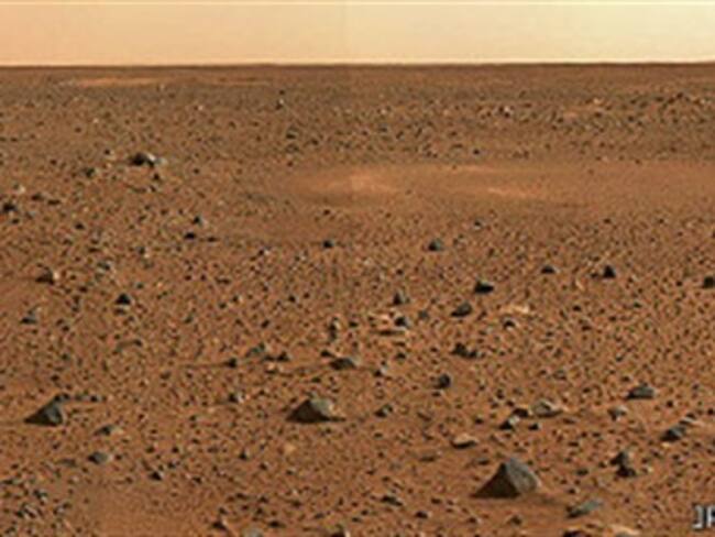 El primitivo Marte habría sido más seco que la Tierra, uno de los factores que habría hecho que la vida apareciera primero allí. Foto: Nasa para BBC Mundo