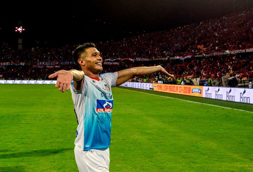 Atletico Junior's Teofilo Gutierrez celebrates after winning the 2018 Colombian Football league final match against Independiente Medellin at Atanasio Girardot stadium, in Medellin, Antioquia department, Colombia on December 16, 2018. (Photo by JOAQUIN SARMIENTO / AFP)        (Photo credit should read JOAQUIN SARMIENTO/AFP via Getty Images)