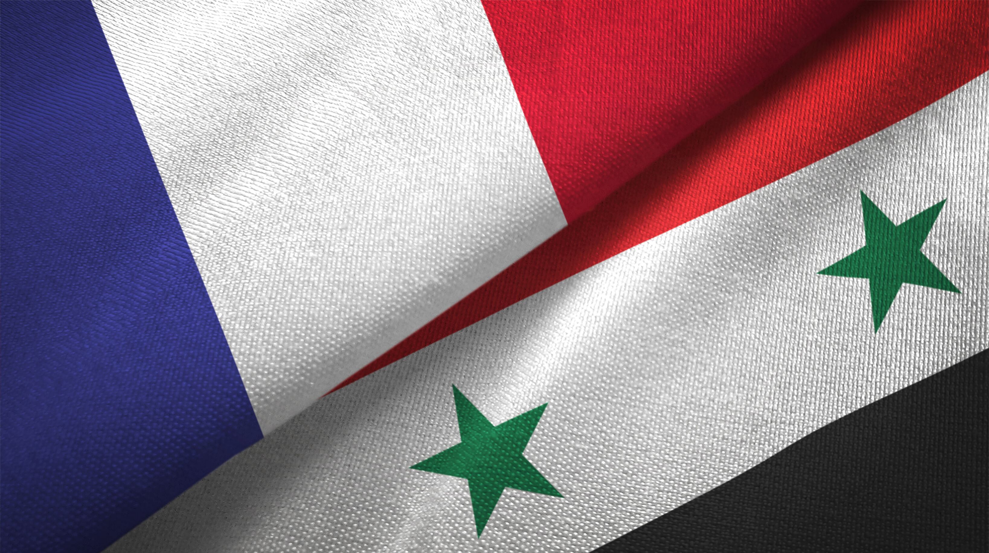 Bandera de Francia y Siria. I Foto: Getty Images.