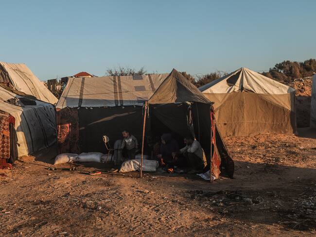 Al Nuseirat (---), 12/10/2024.- An internally displaced Palestinian family sit inside their tent at the Al Nuseirat refugee camp, southern Gaza Strip, 12 October 2024. More than 42,500 Palestinians and over 1,400 Israelis have been killed, according to the Palestinian Health Ministry and the Israel Defense Forces (IDF), since Hamas militants launched an attack against Israel from the Gaza Strip on 07 October 2023, and the Israeli operations in Gaza and the West Bank which followed it. EFE/EPA/MOHAMMED SABER