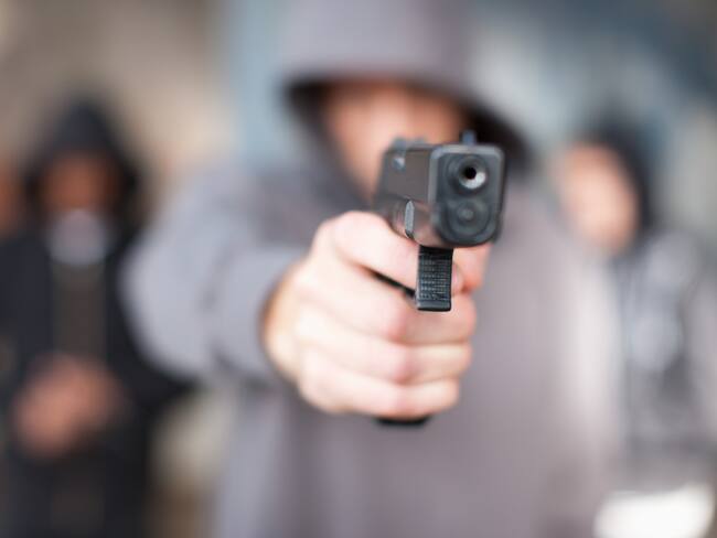 Imagen de referencia de personas armadas. Foto: Getty Images